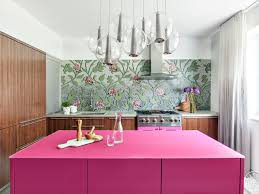 The backsplash, which doubles as a feature wall, is a mix of stained and painted reclaimed wood boards. 13 Pink Kitchens Kitchen Brimming With Grown Up Style