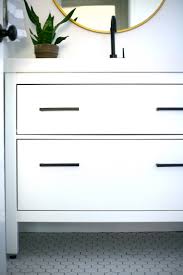 Olga added trim to the cabinet and splashed on a new coat of paint to match her new england style bathroom interior. My Proudest Ikea Hack Classy Modern Vanity From An Ikea Favorite Create Enjoy