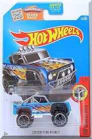 Sky Blue W Black Interior No Windows Gray Top Roll Cage White Stripes Yellow Orange Flames W Blue Checkerboard Graphi Hot Wheels Ford Bronco Hot Weels