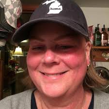 Does cutting peony blooms affect next year's flower production?