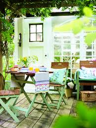 Cute Patio Furniture With A Pastel Green Paint And Floral Cushions Home Furniture Green Garden Floral Interior Outdoor Furniture Sets Outdoor Decor