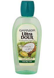 Hair oil treatment nourishes & moisturizes hair, adding shine without greasy residue. Garnier Ultra Doux Hair Oil Enriched With Almond And Coconut Oil 200ml Amazon De Beauty