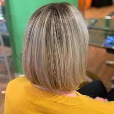 A medium layered bob parted on the side looks fabulous with long feathered layers. Bob Haircut Star Hairstyles