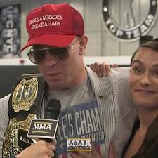 How the fvck you get asked why you weren't as aggressive in a fight and as  a fighter you reply shout out to Donald Trump , secure our border ? What the