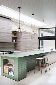 Tiled Kitchen Island In Contemporary Wood Kitchen At Layer House By Robson Rak Architects Contemporary Wood Kitchen Interior Design Kitchen Home Kitchens