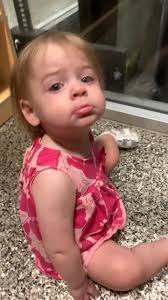 Baby Makes Face in Elevator Woman Singing