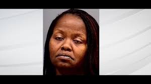 Woman accused of biting and urinating