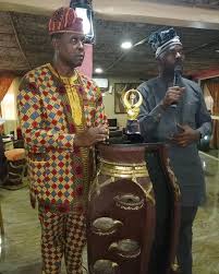 The country representative, Mr Oba Olasunkanmi John with the President,  Continent building initiative and founder La Campagne Tropicana beach  resort Otunba Olawanle Akinboboye, during his nomination as an advisor to  the AU-ECOSOCC... -