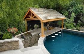 Pools On A Sloped Lot Shelter And Swim Up Bar Is Located At The Shallow End The Pool Pool Houses Backyard Pool Swimming Pool Designs