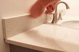 It is attached with adhesive and caulked around the perimeter. How To Install A Pre Made Vanity Top Stagg Design