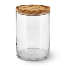 With glass apothecary jars, storage is stylish. Olivewood Glass Canister Kitchen Counter Organizers Williams Sonoma