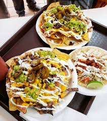 The burritos on the wahoo's fish taco menu with the lowest amount of calories are charbroiled fish classic burrito (455 calories), blackened fish classic burrito (460 calories) and baja roll (475 calories). Nachos For Dinner Los Cotijas Taco Shop Facebook