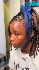 I use the loc smith method to help shape budding locs, and consistency is  key, as regular maintenance will help your locs mature evenly and look  their best. Also, embracing the journey