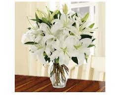 Colorful vases that don't need any lavish flowers to stand out! Flowers In Glass Vase Magic Of White Flowers Bouquet Service Provider From Mumbai
