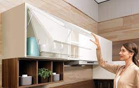 In many instances, open shelving surrounds a range hood evenly on both sides so the entire look feels symmetrical and balanced. 5 Smart Wall Storage Ideas To Upgrade Your Kitchen