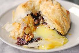Working quickly, brush the top sheet with the honey mixture and lay on the pie plate. Phyllo Baked Brie With Figs And Walnuts Recipe She Wears Many Hats