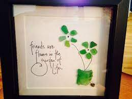 Friends Are Flowers In The Garden Of Life One Of A Kind Original Sea Glass Design Featuring Two Sea Glass Flowers And A Vase Sea Glass Crafts Beach Glass Crafts Pebble Art