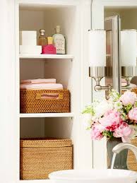 An arched bathroom alcove clad in wainscoting and finished with a green painted ceiling boasts a pedestal freestanding bathtub matched with a chrome vintage style tub filler fixed beneath a window covered in white cafe curtains. Storage Inspiration In The Powder Room This Is Glamorous