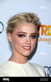2011 amber heard hi-res stock photography and images