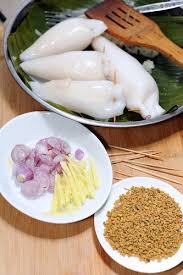 Terengganu (or east coast) traditional food, glutinous rice stuffed squid, boil in coconut milk. Resepi Sotong Sumbat Pulut Terengganu Dunia Belajar