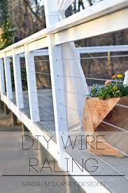 Otherwise you can build a frame from any material you like as long as it is strong enough to handle the load applied by the cable and meet structural building code. Diy Wire Railing Tutorial Sarah M Dorsey Designs Diy Deck Diy Deck Railing Building A Deck