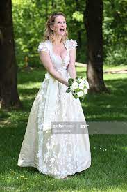 Maybe you would like to learn more about one of these? Monica Ivancan Wearing A Wedding Dirndl By Astrid Soell Poses Wedding Dirndl Dirndl Wedding Dress Wedding Dresses