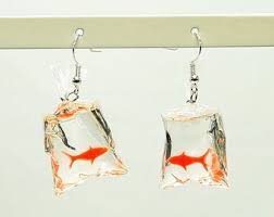 Draw attention to your manicure with a set of stacking rings or add a bit of interest to an outfit with a cool, coin necklace. Cute Earrings Etsy