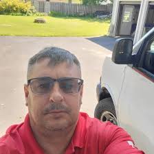 Looking for recommendations for someone to stain our fence to match the old  section