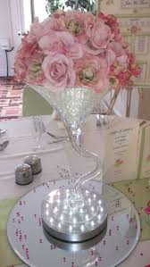 Twisted Martini Vase Weeding Centrepiece With Pink Roses Sitting On An Up Lighter And Martini Centerpiece Wedding Table Centerpieces Cheap Wedding Decorations