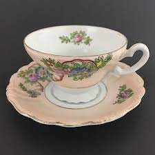 Most likely japanese mon or emblem to identify a particular family. Trimont Hand Painted Teacup And Saucer Made In Occupied Japan Floral Design Gt Tea Cups Tea Cup And Saucer