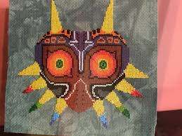 Cross stitch video games point de croix jeux video retrogaming. Legend Of Zelda Majora S Mask Video Game Cross Stitch Framed 9 In X 11 In Ooak Sold By Anne Chan Creations On Storenvy