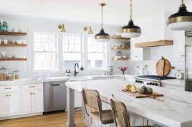 Since the kashmir white granite quarries are still closed colonial white with white ceramic subway backsplash and two tone cabinets. Beautifully Renovated Dutch Colonial Style Home Nestled In New England