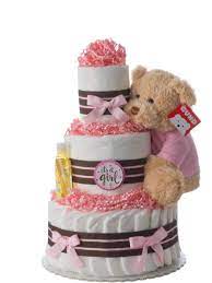 It could be a statue of a mother happily holding her tummy excited for the baby to come out or it is you can also use colored diapers if you want it to be colorful. Amazon Com Darling Girl Handmade Baby Shower Diaper Cake Beautiful Baby Shower Centerpieces For Girls With 42 Usable Swaddler Size Diapers Baby Nursery D Cor Gift Sets Baby