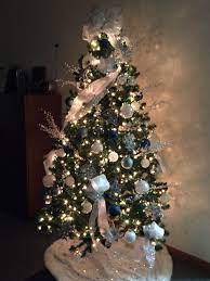 Add them to your christmas tree or hang them from a light fixture for that festive holiday touch. White Silver And Snowflakes Christmas Tree Snowflake Christmas Tree Holiday Decor Christmas Tree