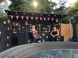 The garden shed boasts two functional event spaces suitable for many occasions. Beer Fan 35 Creates A Bar In His Back Garden Out Of Recycled Pallets And Scrap Wood For Just 90 Daily Mail Online