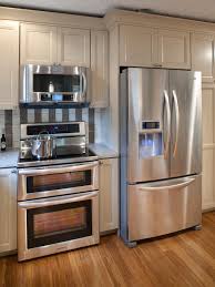 Neutral Kitchen Cabinets With Stainless Steel Refrigerator Neutral Kitchen Cabinets Clean Kitchen Cabinets Affordable Kitchen Appliances