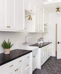 Refined Elegance Is The Name Of This Home S Game Lark Linen Kitchen Black Counter Black Kitchen Countertops Black Countertops