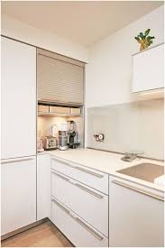 A Bulthaup B3 Roller Shutter Cabinet Creates A Space To Hide Away Those Everyday Items That Often Clutter A Kuchen Design Ideen Kuche Ecklosung Weisse Kuche