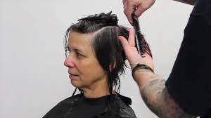 This can make it easier to judge how the hair is being cut and to ensure that each side of the hair cut is even. How To Cut Short Hair Pixie Haircut Tutorial Youtube