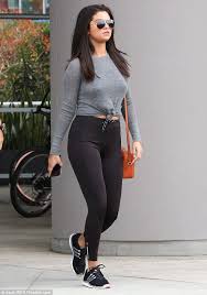 Born and raised in texas. Selena Gomez Shows Off Her Toned Pins In Skintight Leggings Selena Gomez Pokies Gifs Memes Images