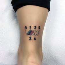 #1 rated collection of beautiful tattoo designs. 70 Bmw Tattoo Ideas For Men Automotive Designs