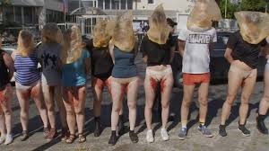 Protesters speak out against the alleged rape of women in Ukraine by  Russian soldiers.