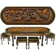 Best asian coffee table from asian coffee tables. Chinese Oval Coffee Table With Hand Carved Battle Scene And Six Stools Chairish