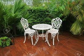 Check out our wrought iron chairs selection for the very best in unique or custom, handmade pieces from our patio furniture shops. Empty White Wrought Iron Garden Tea Table And Chairs In The Patio Stock Photo Picture And Royalty Free Image Image 124742355