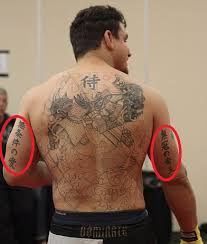 When your arms grow, it's the skin around the armpit that shows the evidence. Frank Mir S 5 Tattoos Their Meanings Body Art Guru