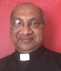 Faithful Gather to Honor Blessed Mother and All Mothers at Catholic Cemetery