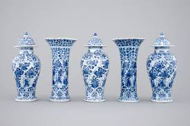 Decorated with beautiful flowers and a family. A Blue And White Chinese Porcelain Garniture Of 5 Vases Kangxi 18th C Rob Michiels Auctions