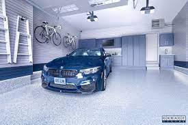 Discover a wide variety of garage ideas, layouts and storage organized living freedomrail garage designed by the amandas. A Driving Enthusiast S Garage Garage Living