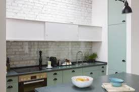 The slabs feature a creamy white background with prominent gray veins. Best 60 Modern Kitchen Granite Counters White Cabinets Design Photos Dwell