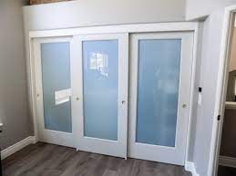 Sliding closet door tracks track kits at lowes com. 3 Panel 2 Track Ovation Sliding Closet Doors With White Laminated Glass Panels Classic Improvement Products